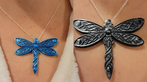 Blue and black 3D-printed Celtic weave dragonfly pendants worn on chains