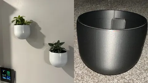 White 3D-printed wall planters with plants on a wall, and a close-up of a black pot